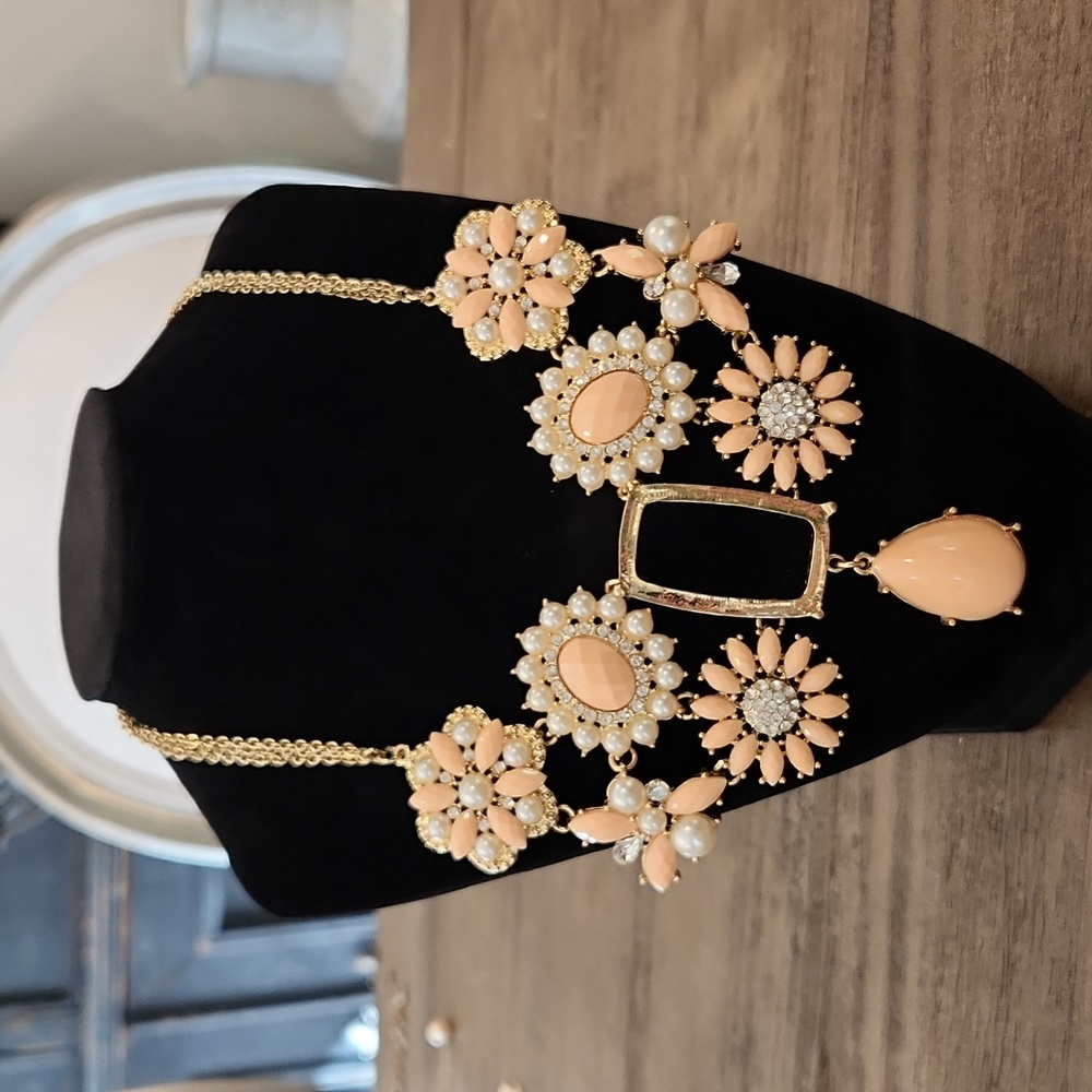 Gold Tone Necklace with peach beads.